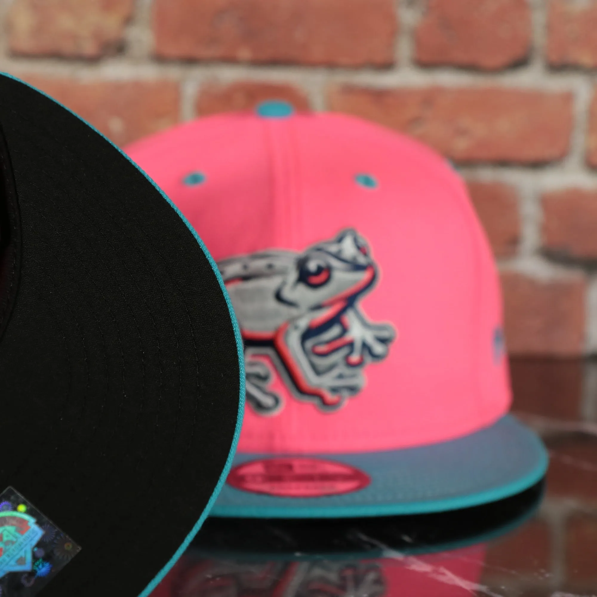 Lehigh Valley Ironpigs Coqui Copa De La Diversion 2023 Two-Tone Black Bottom 9Fifty Snapback Hat | Pink/Blue 950